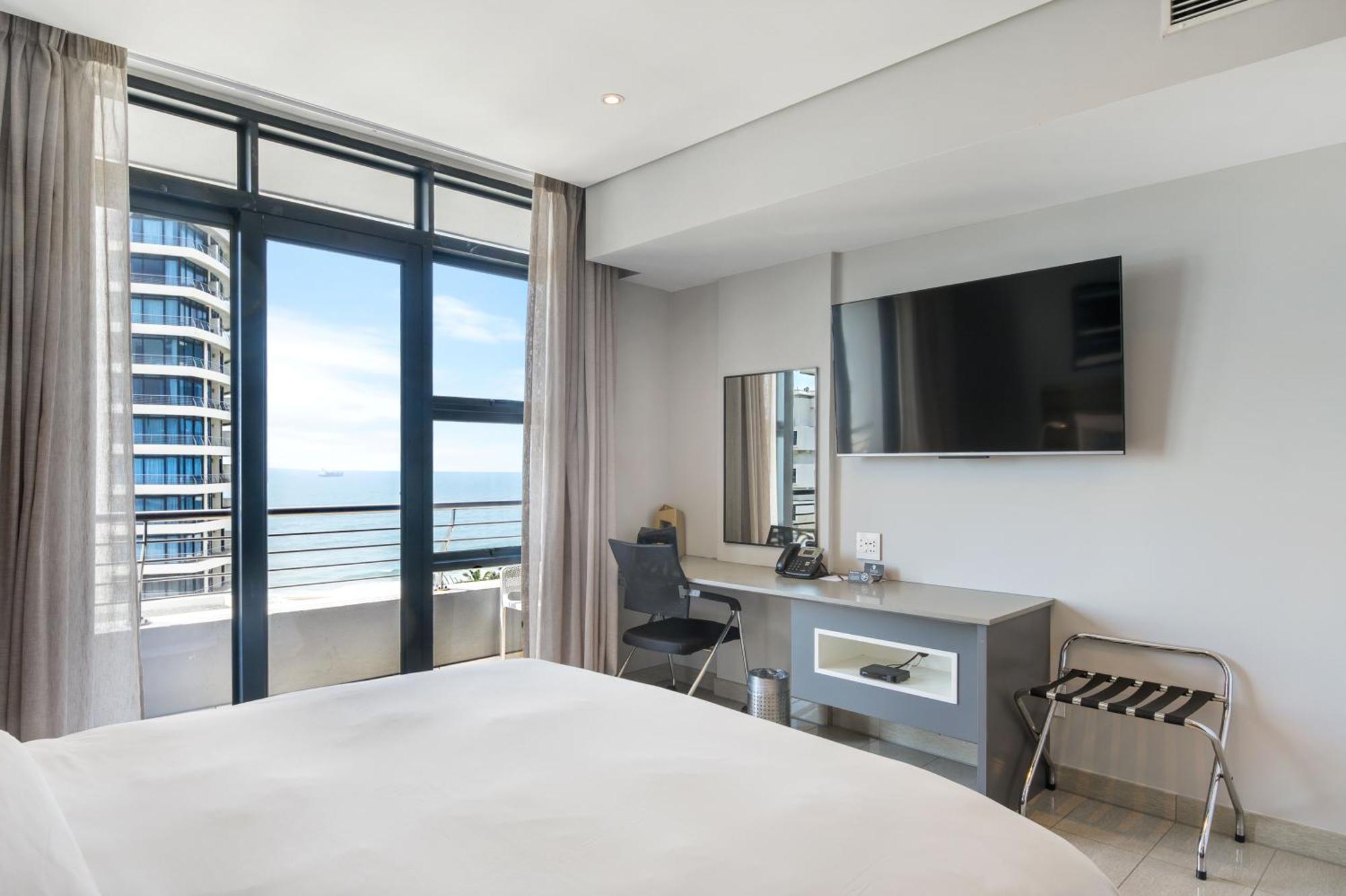 ذا كابيتال بيرلز دوربان المظهر الخارجي الصورة A bedroom at the hotel