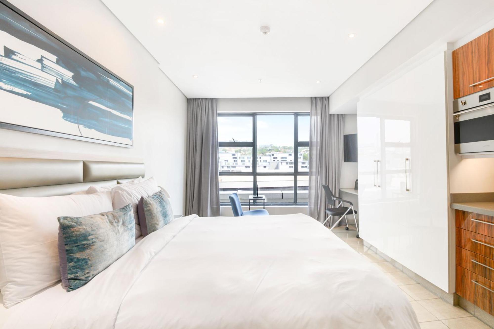 ذا كابيتال بيرلز دوربان المظهر الخارجي الصورة A bedroom at the hotel